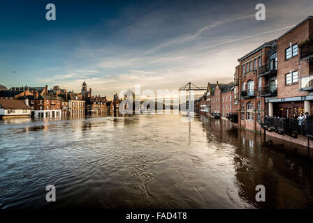 York, UK. 27th December, 2015. Widespread disruption continues in York due to flooding of the River Ouse and River Foss.  View of the swollen River /ouse from Ouse Bridge in York city centre. Photo Bailey-Cooper Photography/Alamy Live News Stock Photo