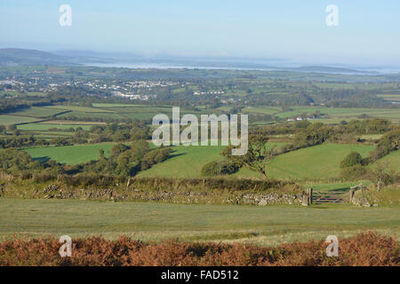 View from Whitchurch Common on the edge of Dartmoor National Park looking over farm fields towards the Devon coast. England Stock Photo