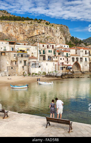 Medieval houses and La Rocca hill, Cefalu Old Town, Sicily, Italy Stock Photo