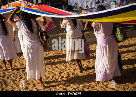 People praying at Sri Maha Bodhi (sacred bodhi tree), Anuradhapura, North Central Province, Sri Lanka,  UNESCO world heritage Stock Photo