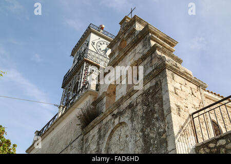 Clock on top of Greek Orthodox Church in Exantheia, Lefkada, Greece. Stock Photo
