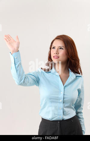 woman using invisible touch screen Stock Photo