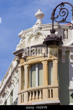 ancient architectural detail of building and lamppost Stock Photo