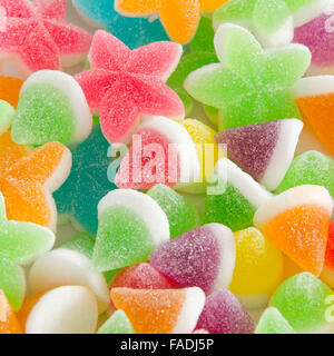 Many bright color jelly candies, sweets with sugar tasty as jujube and lollipops. Stock Photo