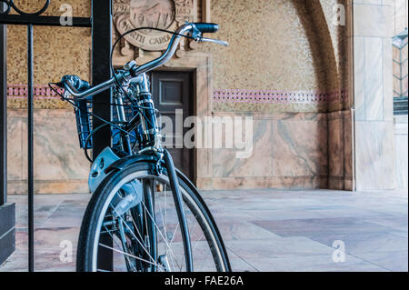 Bicycle parked at the entrance to the Art Deco styled Asheville City Hall in Asheville, North Carolina. (USA) Stock Photo