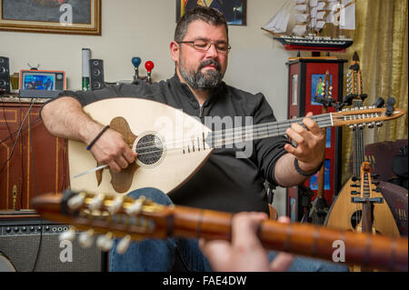 Man playing Greek Lute Stock Photo