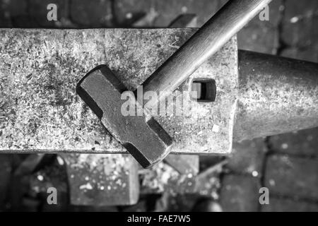 Blacksmith's Hammer sitting in a forge Stock Photo