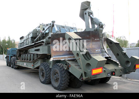 An old Soviet Armored troop-carrier on the street Armoured personnel carrier Stock Photo