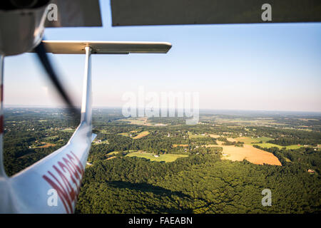 View of rural landscape from the back of a plane Stock Photo