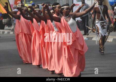 (151228) -- CALABAR(NIGERIA), Dec. 28, 2015 (Xinhua) -- Performers dance during the parade of Calabar Carnival in Calabar, the capital of Cross River State in Southeast Nigeria, Dec. 28, 2015. Calabar carnival festival, also tagged 'Africa's Biggest street Party', kicked off in Calabar on Monday and tens of thousands of local residents watched the parade. Performers from Italy, Brazil, Spain, Kenya and Zimbabwe took part in the event. (Xinhua/Jiang Xintong) Stock Photo