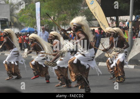 (151228) -- CALABAR(NIGERIA), Dec. 28, 2015 (Xinhua) -- Performers dance during the parade of Calabar Carnival in Calabar, the capital of Cross River State in Southeast Nigeria, Dec. 28, 2015. Calabar carnival festival, also tagged 'Africa's Biggest street Party', kicked off in Calabar on Monday and tens of thousands of local residents watched the parade. Performers from Italy, Brazil, Spain, Kenya and Zimbabwe took part in the event. (Xinhua/Jiang Xintong) Stock Photo