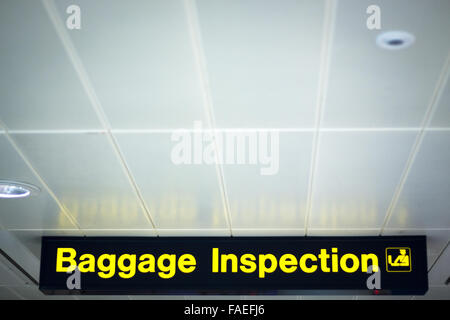 Airport baggage inspection information sign light panel giving ...