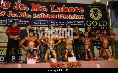 Lahore, Pakistan. 28th Dec, 2015. Pakistani body builders posing during Mr. Lahore & Junior Mr. Lahore body building competition organised by Lahore body building association & Pakistan bodybuilding federation in local hotel Lahore. © Rana Sajid Hussain/Pacific Press/Alamy Live News Stock Photo