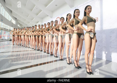 Qingdao, China. 29th Dec, 2015. Candidates prepare before an audition for model & flight attendant in Qingdao, east China's Shandong Province, Dec. 28, 2015. A professional audition for model & flight attendant facing national high schools was held here on Monday, attracting more than 1,000 high school graduates from across the country. Credit:  Xinhua/Alamy Live News Stock Photo