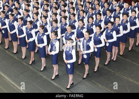 Qingdao, China. 29th Dec, 2015. Candidates attend an audition for model & flight attendant in Qingdao, east China's Shandong Province, Dec. 28, 2015. A professional audition for model & flight attendant facing national high schools was held here on Monday, attracting more than 1,000 high school graduates from across the country. Credit:  Xinhua/Alamy Live News Stock Photo