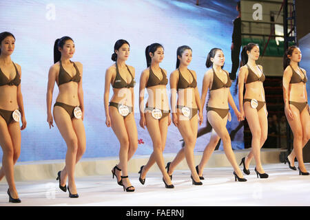 Qingdao, China. 29th Dec, 2015. Candidates attend an audition for model & flight attendant in Qingdao, east China's Shandong Province, Dec. 28, 2015. A professional audition for model & flight attendant facing national high schools was held here on Monday, attracting more than 1,000 high school graduates from across the country. Credit:  Xinhua/Alamy Live News Stock Photo