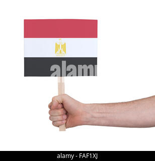 Hand holding small card, isolated on white - Flag of Egypt Stock Photo