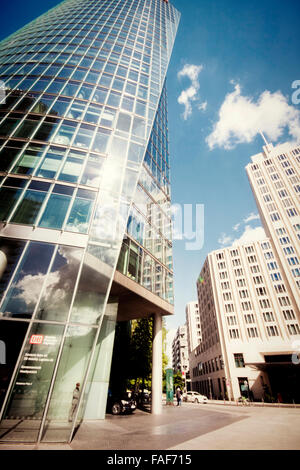 Potsdamer Platz landmark and lively meeting point in Berlin: modern architecture, clouds reflecting on a building glass facade Stock Photo