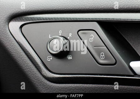 Detail on buttons controlling the windows in a car Stock Photo