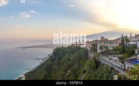 The bay of Giardini-Naxos with the Etna and Catania in the background viewed from Taormina, Sicily Italy. Stock Photo