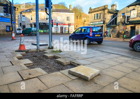 Hebden Bridge, UK. 29th Dec, 2015. Paving stones torn up following the Boxing Day floods in Hebden Bridge Credit:  Graham Hardy/Alamy Live News Stock Photo
