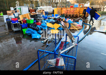 Hebden Bridge, UK. 29th Dec, 2015. School furniture, books and equipment, destroyed in the Hebden Bridge Boxing Day floods,  are piled up in the Riverside Junior School playground, while volunteers load it into skips and vans. Credit:  Graham Hardy/Alamy Live News Stock Photo