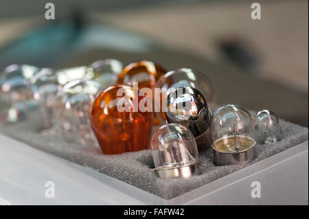 old blown rear silvered filament bulb mixed in with set of replacement bulbs for car necessary to travel in Europe Stock Photo