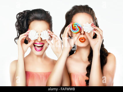 Portrait of a girl with sweets. Funny portrait. Stock Photo