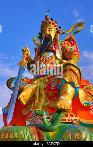 Statue of Taoist God Xuan-tian-shang-di on Lotus Lake Stock Photo ...