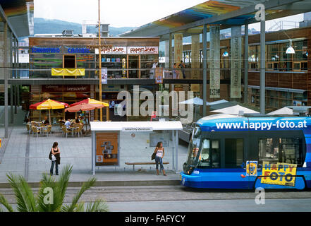 A tram arriving in the cental square of Pichling Solar City, a new sustainable suburb of Linz, Austria. Stock Photo