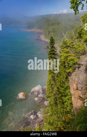 Rocky shoreline of Lake Superior in Hunters Point Park in Copper Harbor ...