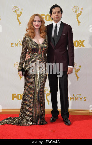 LOS ANGELES, CA - SEPTEMBER 20, 2015: Christina Hendricks & husband Geoffrey Arend at the 67th Primetime Emmy Awards at the Microsoft Theatre LA Live. Stock Photo