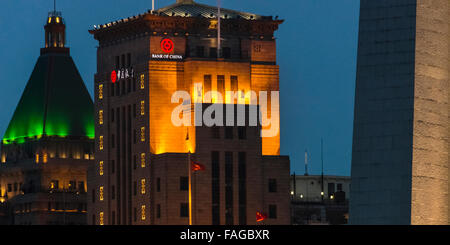 Night view of colonial buildings, Peace Hotel and Bank of China, on the Bund, Shanghai, China Stock Photo