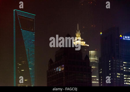 Night view of Shanghai World Financial Center, Jinmao Tower and other high rises in Pudong dominated by Shanghai World Finance C Stock Photo