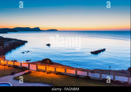 Sunrise over the calm beautiful water in Es Canar, Ibiza, part of the Balearic Islands in Spain,Europe. Stock Photo