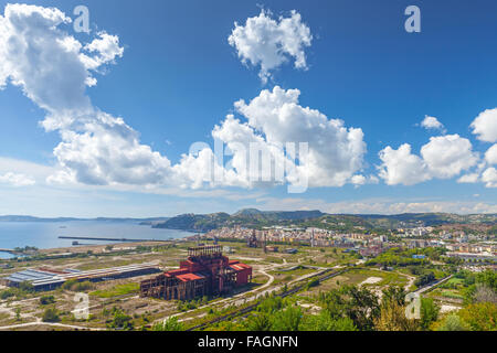 Abandoned iron and steel works factory on the outskirts of Naples. Bagnoli, ex industrial area Stock Photo