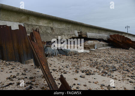 Damage caused by bad weather to the sea wall on the promenade at Southsea, Hampshire, England. Stock Photo