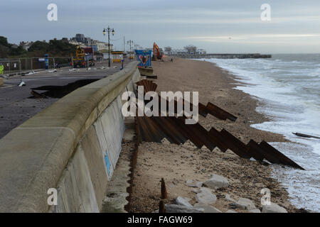 Damage caused by bad weather to the sea wall on the promenade at Southsea, Hampshire, England. Stock Photo