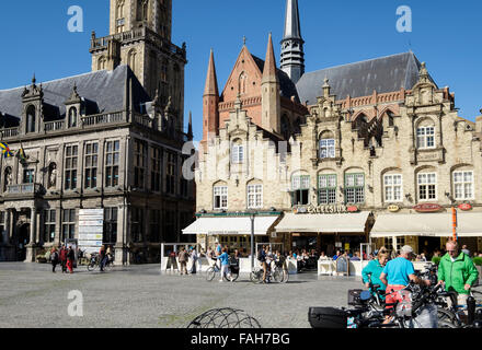 Cafes and restaurants in old Renaissance style buildings around town market square. Grote Markt Veurne West Flanders Belgium Stock Photo