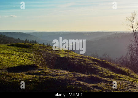 View from Brown's Folly over valleys near Bath, Somerset, UK. A misty late afternoon view over the former quarry Stock Photo