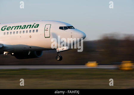 Landing Boeing 737 passenger aircraft of Germania airline at Zurich Kloten airport. Stock Photo