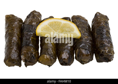 Stuffed grape leaves with olive oil Stock Photo