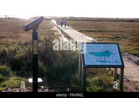 Information board and telescope at St. Peter's well meadow, West Mersea, Essex Stock Photo