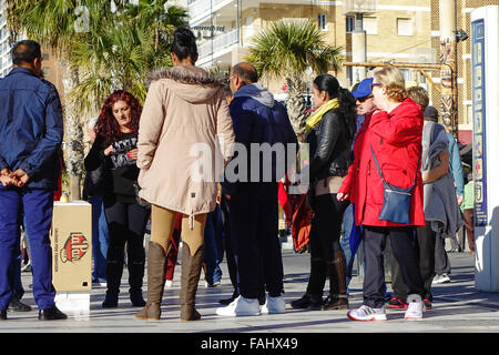 Pea men, peamen, shell men, con men, most of the people in this picture are part of the game to trap tourists in Benidorm Stock Photo