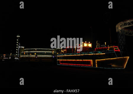 Night view, to Pleasure Beach Casino, Illumination Tour Frigate Tram at South Shore Turning Circle, Blackpool Illuminations, UK Stock Photo