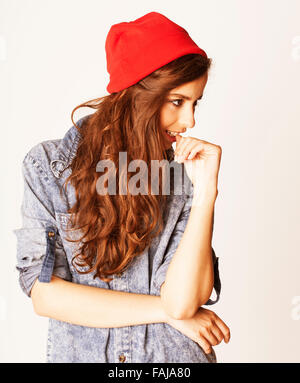 young cheerful brunette teenage girl on white background Stock Photo