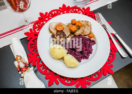 Decorated Christmas plate and table setting Stock Photo