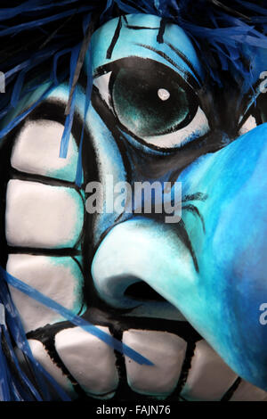Closeup of a single basel carnival mask showing a so called Waggis with big nose and broad grin. Stock Photo