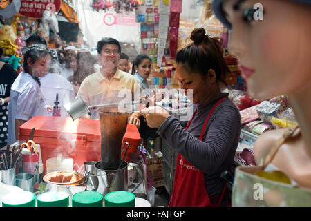 Pouring traditional tea in Bangkok's Chinatown, Thailand Stock Photo
