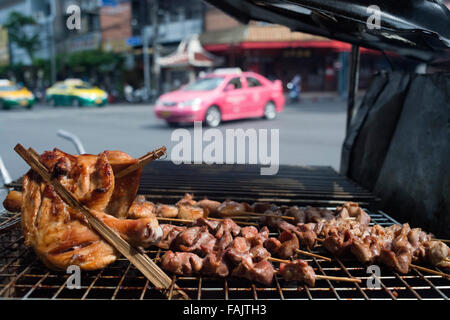 BBK in the street. Market stall and street food being prepared in Chinatown Bangkok, Thailand. Yaowarat, Bangkok’s Chinatown, is Stock Photo